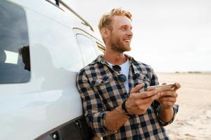 Man using PayPal app to checkout as guest on phone