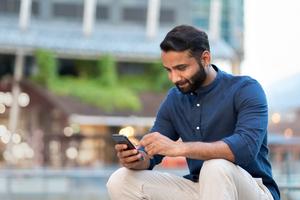 A man using his mobile phone