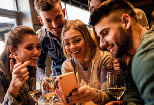 A group of friends dining at a restaurant