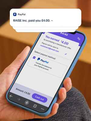 Person holding their mobile phone with RAI$E application open; PayPal selected as a payout method