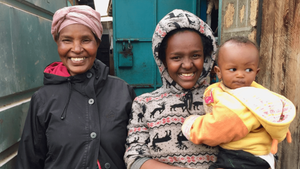 Photo of grandmother, mother and daughter.