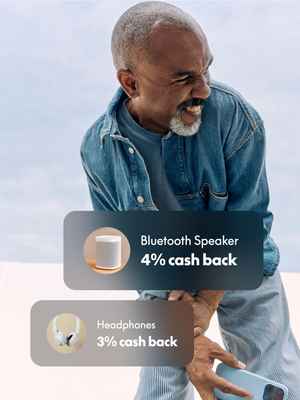 Man wearing denim smiling with cash back offer overlay